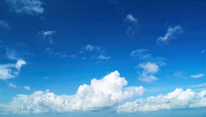 Fototapeta premium Bright Summer Sky with Fluffy White Clouds