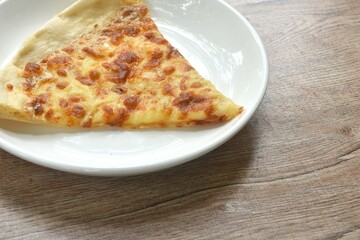 piece of baking homemade pizza topping truffle on plate 