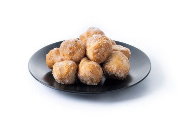 Traditional Carnival fritters or buñuelos e viento isolated on white background. .