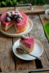 Sablée Breton Cherry Cheesecake decorated with frozen berries
