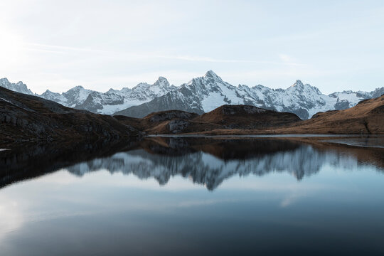 View of tranquil Lacs de Fenetre with beautiful reflections surrounded by majestic mountains, La Fouly, Switzerland.