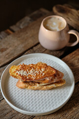 French toast with cheese. Top view, wooden background