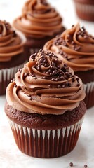 Chocolate cupcakes with frosting, close up,  sweet treat