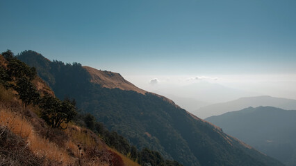 GHOREPANI, NEPAL - JANUARY 10, 2025: Ghorepani day trek with stunning mountain views and rich nature in Nepal's Annapurna, pan.