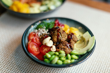 Colorful vegetable poke bowls on a summer table, showcasing fresh, healthy ingredients and vibrant seasonal vibes
