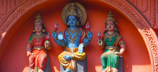 statues of Vishnu God with his Wives