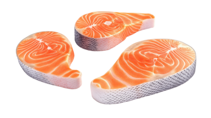Fresh salmon fillets displayed on a clean counter ready for cooking or preparation in a kitchen setting