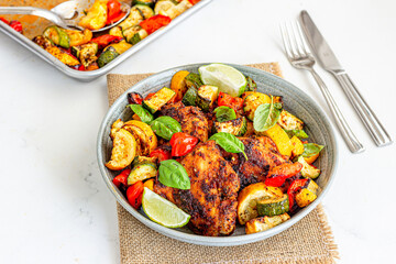 Baked Chicken with Vegetables in a Bowl on White Background, Low Angle Close-Up Roast Chicken Photo