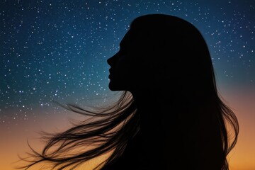 A silhouette of a woman with long hair against a bright background