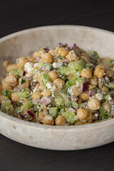 delicious healthy salad with chickpeas, cucumber, and feta cheese close-up