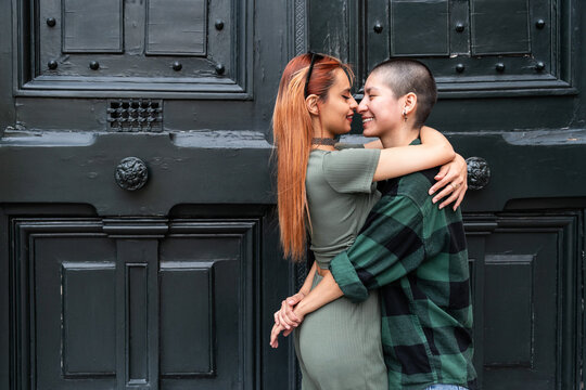 Colombian lesbian couple embracing in a display of love and equality