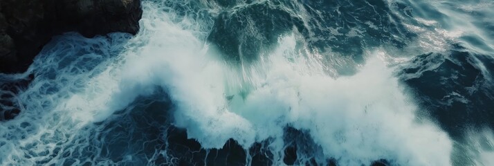 Chaotic ocean waves crashing over coastal rocks