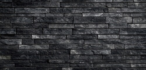 Textured Black Stone Wall: An Elegant and Contemporary Design Element for Modern Interiors