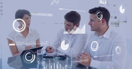 Image of financial data processing over diverse colleagues discussing work in office