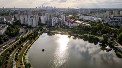 Fototapeta premium Residential buildings over Balaton Lake in Goclaw area, subdistrict of Praga-Poludnie, Warsaw city, Poland
