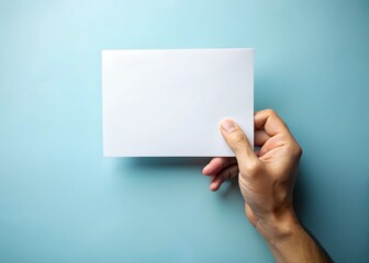 Fototapeta premium Hand Holding Blank White Paper