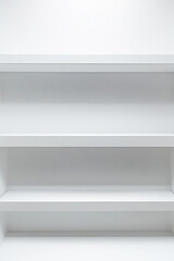 Empty white shelves creating a minimalist space for interior design ideas and organization