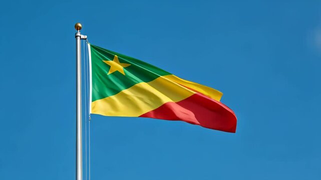 national flag of congo waving on blue sky, banner on the wind