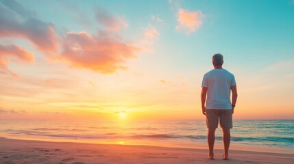 Fototapeta premium Contemplative man watching sunset beach serene environment side view reflection on life