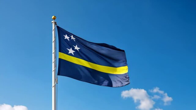 national flag of curacao waving on blue sky, banner on the wind