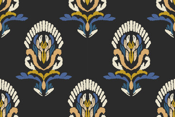 Embroidered Ikat flower pattern on a black background. Traditional ethnic ikat, Aztec abstract vector pattern, seamless pattern in tribal, folk embroidery and Mexican style.