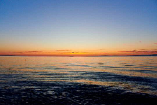 Dawn on Lake Alakol. Lake Alakol is a salt lake located in the Zhetysu and Abay regions of the Republic of Kazakhstan. Blur effect.