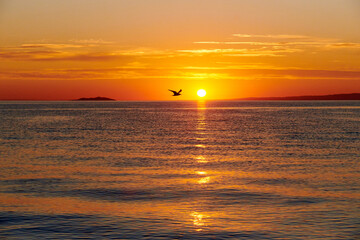 Dawn on Lake Alakol. Lake Alakol is a salt lake located in the Zhetysu and Abay regions of the Republic of Kazakhstan. Blur effect.