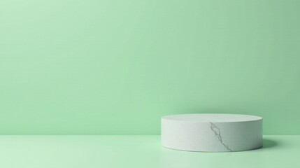 Elegant Minimalist Cylindrical Display Platform on a Pale Green Background, Ideal for Product Showcasing or Abstract Composition