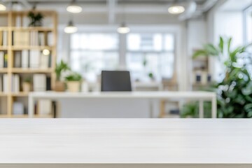 Bright white rectangular wooden table with overhead lighting and blurred office background featuring desk, bookshelves, and plants

