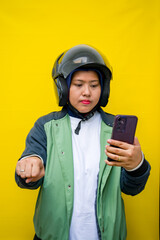 Woman driving while reading mobile phone