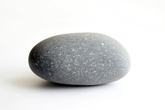 Gray stone pebble on white background