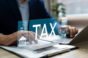 Tax and Vat concept. Government, state taxes concept. Businesman using calculator and laptop to...
