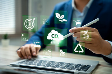 CO2 reduction, CO2 emissions impact, Businessman analyzing carbon footprint and sustainable solutions for global warming mitigation, Business solutions for reducing CO2 emissions, renewable energy.