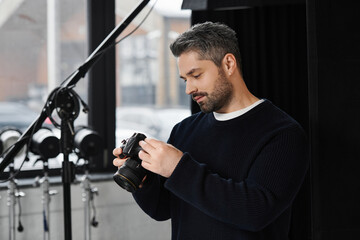 Creative pro captures stylish moments in the studio, focusing on camera settings