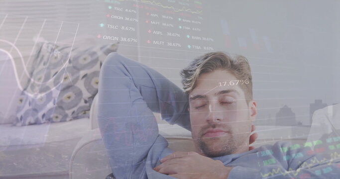 Image of financial data processing over caucasian man sleeping - Powered by Adobe