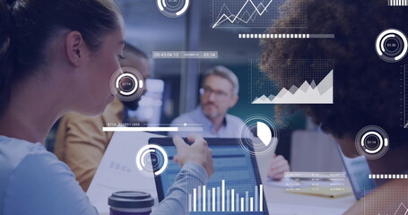 Image of financial data processing over diverse business people in office