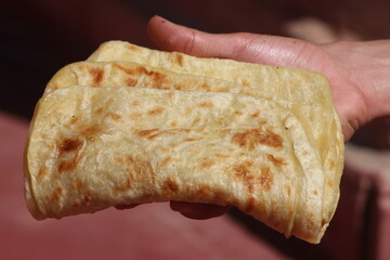 A close-up of the traditional Moroccan flatbread known as Msemmen or Msemen