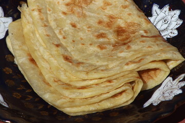A close-up of the traditional Moroccan flatbread known as Msemmen or Msemen
