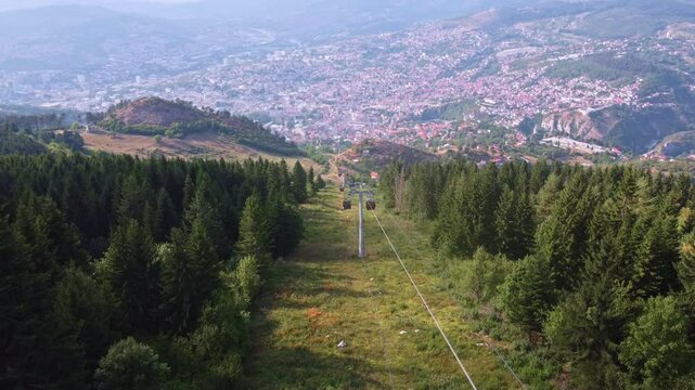Aerial panoramic view of the city of Sarajevo, a tourist destination in Eastern Europe. View from a distance of the capital of Bosnia and Herzegovina