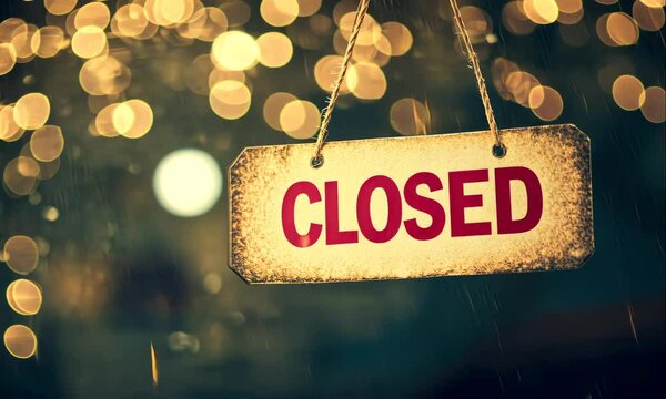 closed sign hanging in store at night animation