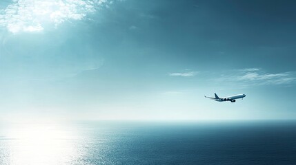 A beautiful, clear sky with an airplane flying high above the ocean, showing the vastness of the transatlantic journey over the deep waters.