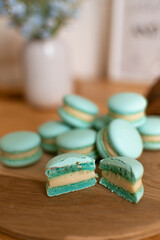 Blue macarons with coconut. Scandinavian kitchen.