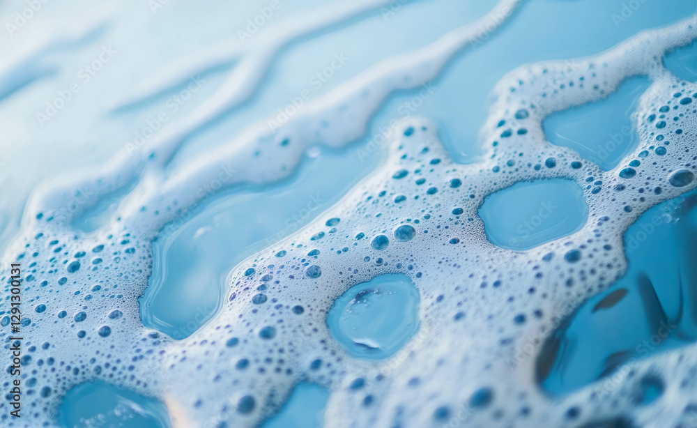 Poster close-up of window washing with soap suds and water droplets for cleaning concepts