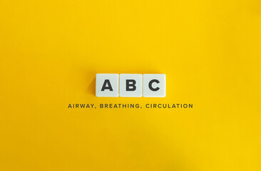 Airway, Breathing, Circulation - ABC. Block Letter Tiles on Flat Background. Minimalist Aesthetics.