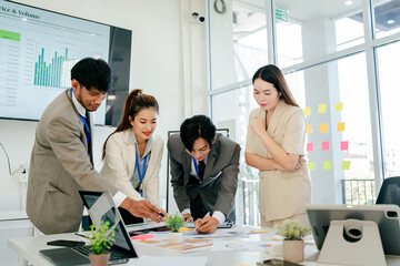 Group of people are working together in a conference room