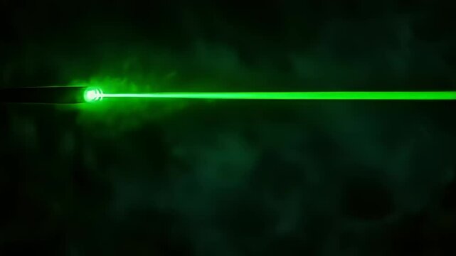 Green Laser Beam Emitting from a Pointer in Darkness