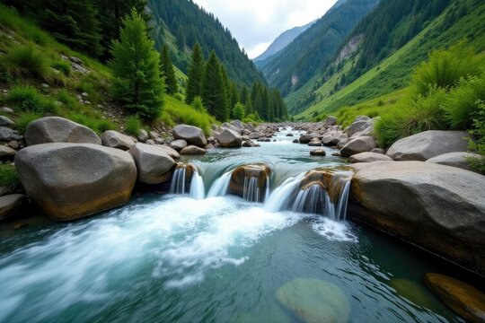 Cascading water over rocks in a mountainous area at Chilik river, caucasus, serene