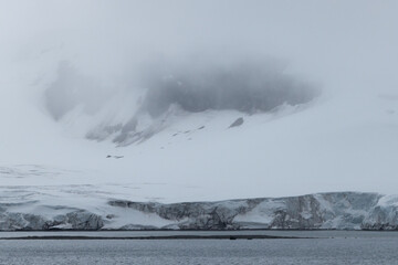 Antarctica mountain with cloud and snow