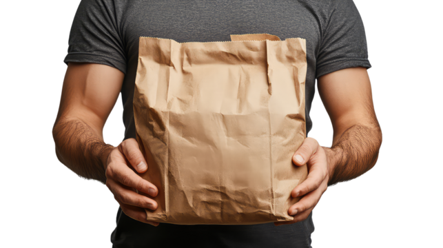 Msn holding a paper shopping bag isolated on transparent background. 