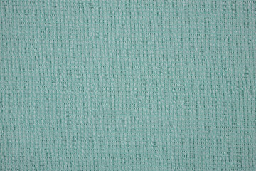 Textile close up of a light blue  fabric, fabric texture as a background.
